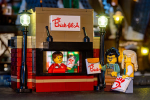Brick-Fil-A Stand with Employee Minifig made using LEGO parts